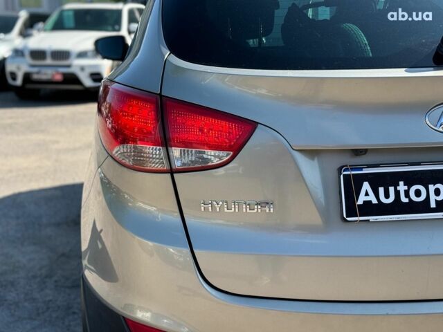 Зелений Хендай іх35, об'ємом двигуна 2 л та пробігом 246 тис. км за 10890 $, фото 13 на Automoto.ua