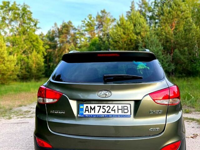 Зелений Хендай іх35, об'ємом двигуна 2 л та пробігом 115 тис. км за 11200 $, фото 4 на Automoto.ua