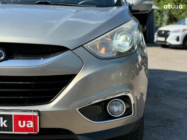 Зелений Хендай іх35, об'ємом двигуна 2 л та пробігом 246 тис. км за 10890 $, фото 9 на Automoto.ua