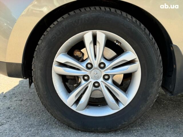 Зелений Хендай іх35, об'ємом двигуна 2 л та пробігом 246 тис. км за 10890 $, фото 7 на Automoto.ua