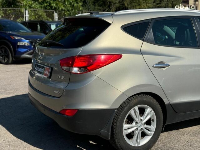 Зелений Хендай іх35, об'ємом двигуна 2 л та пробігом 246 тис. км за 10890 $, фото 11 на Automoto.ua