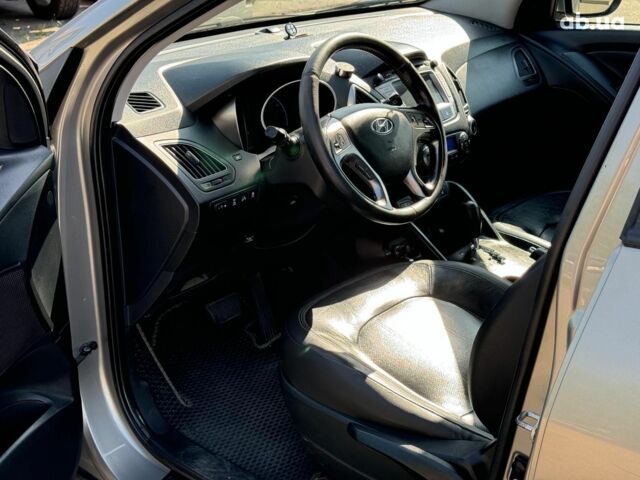 Зелений Хендай іх35, об'ємом двигуна 2 л та пробігом 246 тис. км за 10890 $, фото 18 на Automoto.ua