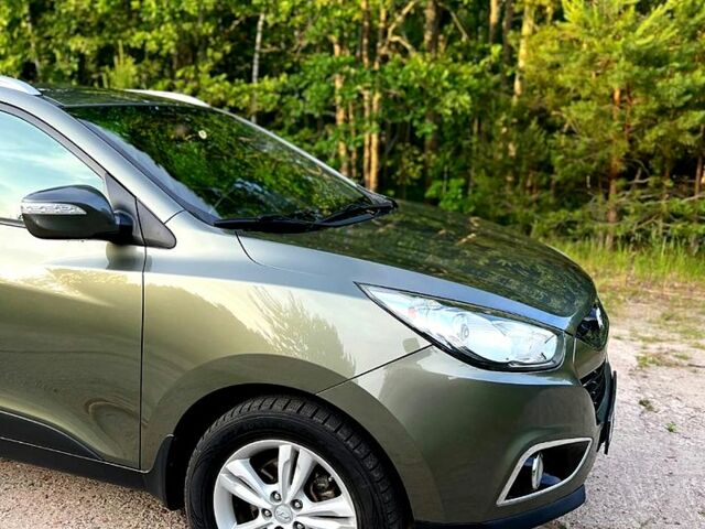 Зелений Хендай іх35, об'ємом двигуна 2 л та пробігом 115 тис. км за 11200 $, фото 2 на Automoto.ua
