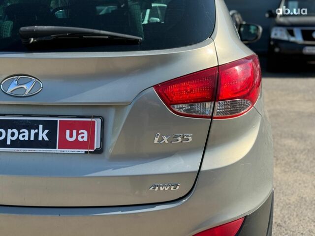 Зелений Хендай іх35, об'ємом двигуна 2 л та пробігом 246 тис. км за 10890 $, фото 12 на Automoto.ua