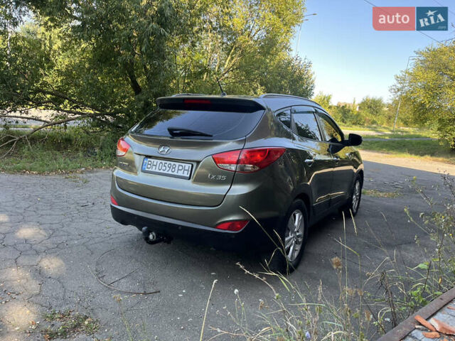 Зеленый Хендай их35, объемом двигателя 2 л и пробегом 186 тыс. км за 11000 $, фото 4 на Automoto.ua