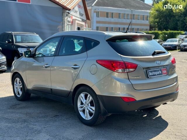 Зелений Хендай іх35, об'ємом двигуна 2 л та пробігом 246 тис. км за 10890 $, фото 6 на Automoto.ua