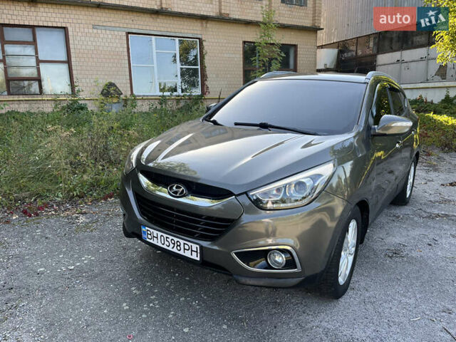 Зеленый Хендай их35, объемом двигателя 2 л и пробегом 186 тыс. км за 11000 $, фото 11 на Automoto.ua