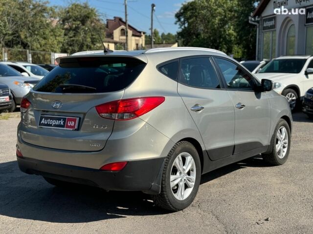 Зелений Хендай іх35, об'ємом двигуна 2 л та пробігом 246 тис. км за 10890 $, фото 4 на Automoto.ua