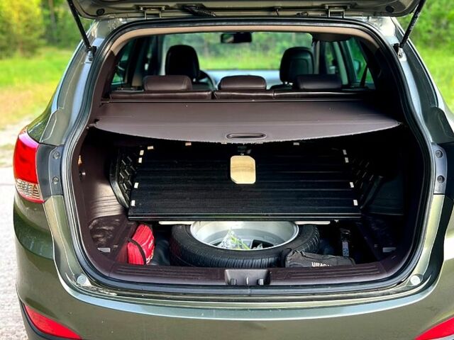 Зелений Хендай іх35, об'ємом двигуна 2 л та пробігом 115 тис. км за 11200 $, фото 5 на Automoto.ua