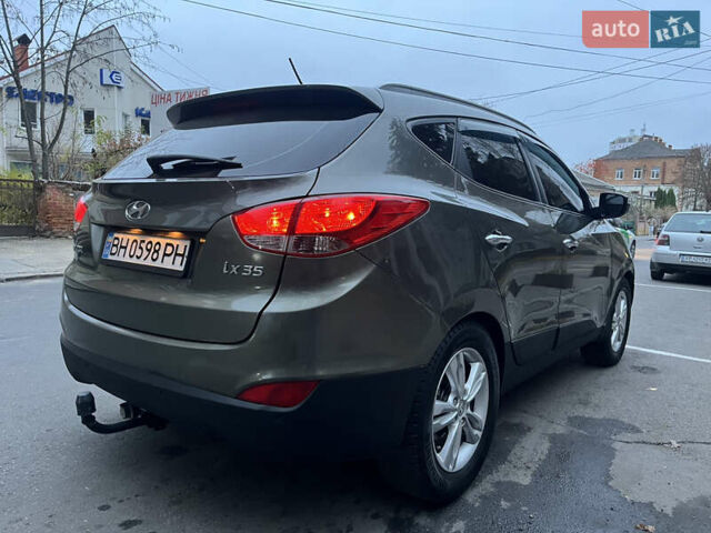 Зеленый Хендай их35, объемом двигателя 2 л и пробегом 187 тыс. км за 10999 $, фото 3 на Automoto.ua