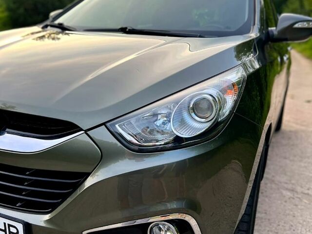 Зелений Хендай іх35, об'ємом двигуна 2 л та пробігом 115 тис. км за 11200 $, фото 8 на Automoto.ua