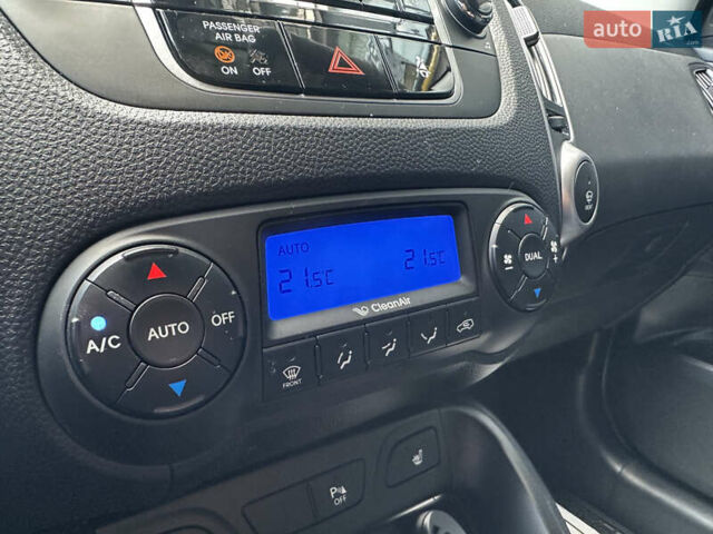 Зелений Хендай іх35, об'ємом двигуна 2 л та пробігом 212 тис. км за 13650 $, фото 23 на Automoto.ua