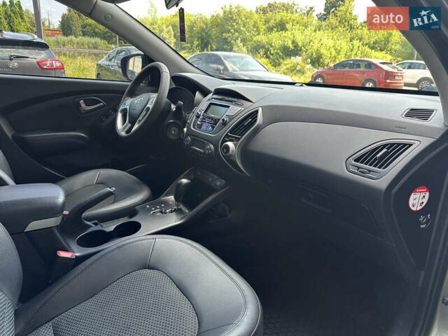 Зелений Хендай іх35, об'ємом двигуна 2 л та пробігом 212 тис. км за 13650 $, фото 16 на Automoto.ua