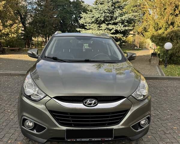 Зеленый Хендай их35, объемом двигателя 2 л и пробегом 170 тыс. км за 14400 $, фото 3 на Automoto.ua