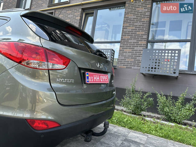 Зелений Хендай іх35, об'ємом двигуна 2 л та пробігом 212 тис. км за 13650 $, фото 8 на Automoto.ua
