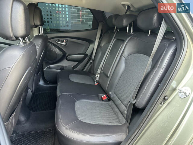 Зелений Хендай іх35, об'ємом двигуна 2 л та пробігом 212 тис. км за 13650 $, фото 18 на Automoto.ua