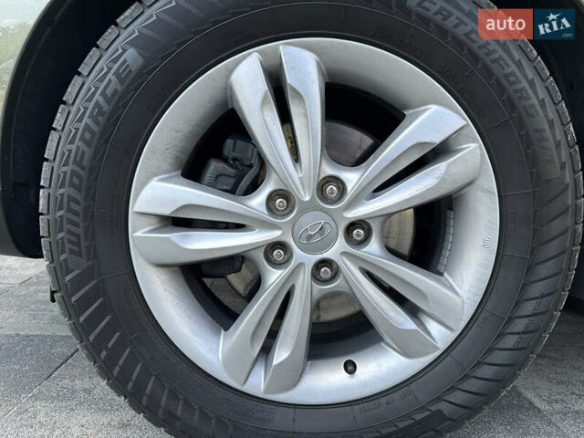 Зелений Хендай іх35, об'ємом двигуна 2 л та пробігом 212 тис. км за 13650 $, фото 13 на Automoto.ua