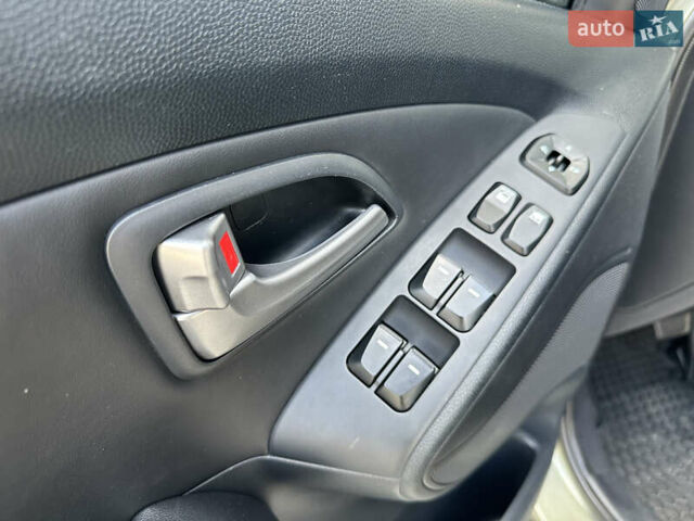 Зелений Хендай іх35, об'ємом двигуна 2 л та пробігом 212 тис. км за 13650 $, фото 26 на Automoto.ua