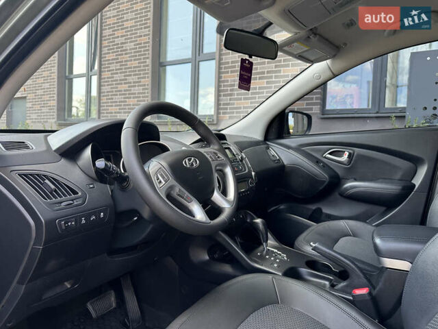 Зелений Хендай іх35, об'ємом двигуна 2 л та пробігом 212 тис. км за 13650 $, фото 15 на Automoto.ua