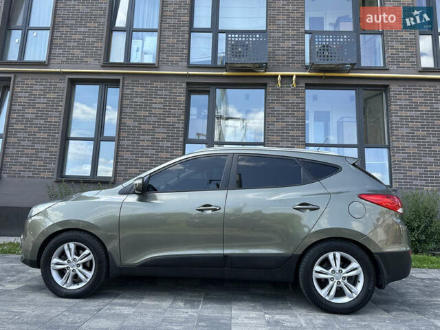 Зелений Хендай іх35, об'ємом двигуна 2 л та пробігом 212 тис. км за 13650 $, фото 5 на Automoto.ua