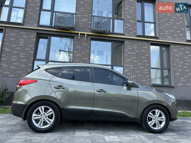 Зелений Хендай іх35, об'ємом двигуна 2 л та пробігом 212 тис. км за 13650 $, фото 4 на Automoto.ua