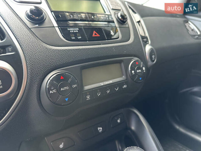 Зелений Хендай іх35, об'ємом двигуна 2 л та пробігом 212 тис. км за 13650 $, фото 20 на Automoto.ua