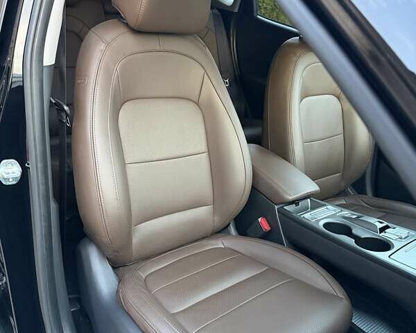 Черный Хендай Kona Electric, объемом двигателя 0 л и пробегом 125 тыс. км за 18599 $, фото 71 на Automoto.ua