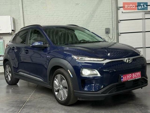 Синий Хендай Kona Electric, объемом двигателя 0 л и пробегом 116 тыс. км за 17604 $, фото 2 на Automoto.ua