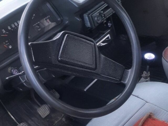 Желтый ИЖ 2125 Комби, объемом двигателя 1.5 л и пробегом 100 тыс. км за 500 $, фото 4 на Automoto.ua