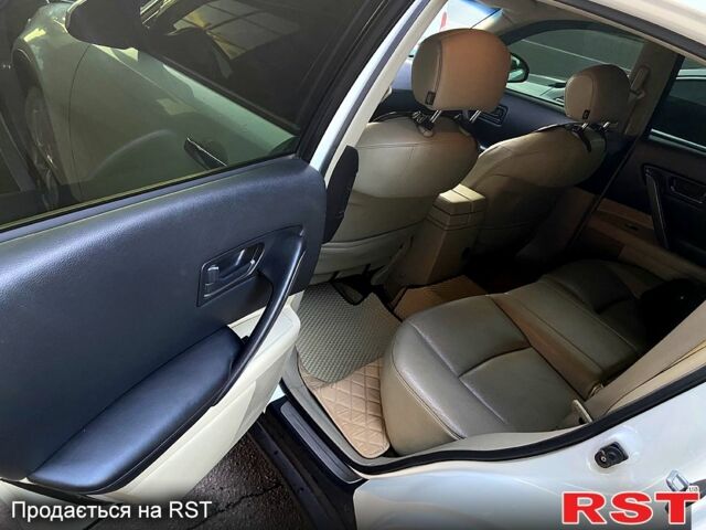 Белый Инфинити ФХ, объемом двигателя 3.5 л и пробегом 280 тыс. км за 9850 $, фото 4 на Automoto.ua