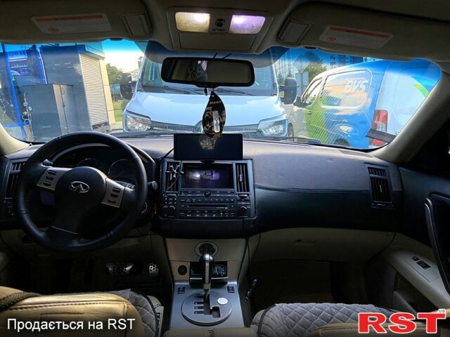 Белый Инфинити ФХ, объемом двигателя 3.5 л и пробегом 280 тыс. км за 9850 $, фото 6 на Automoto.ua