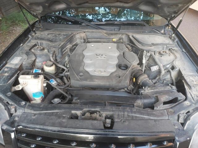 Черный Инфинити ФХ, объемом двигателя 3.5 л и пробегом 172 тыс. км за 9500 $, фото 4 на Automoto.ua