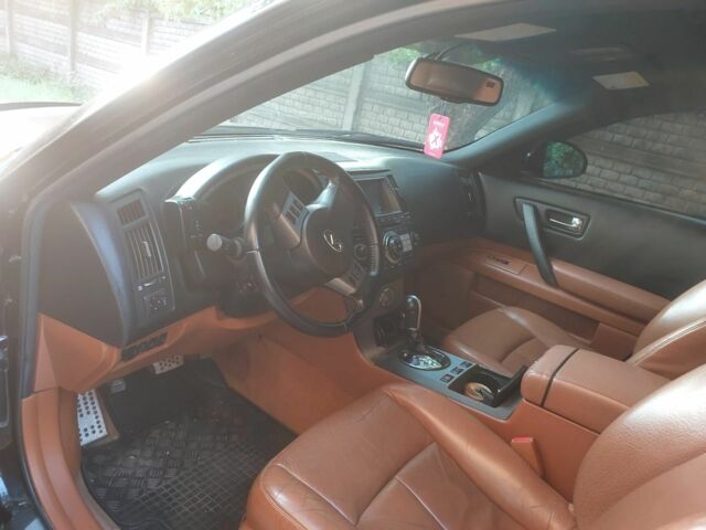 Черный Инфинити ФХ, объемом двигателя 3.5 л и пробегом 172 тыс. км за 9500 $, фото 2 на Automoto.ua