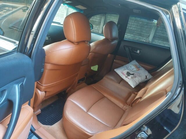 Черный Инфинити ФХ, объемом двигателя 3.5 л и пробегом 172 тыс. км за 9500 $, фото 5 на Automoto.ua