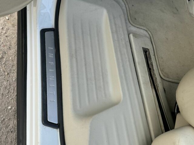 Инфинити ЖХ 2012 в Кропивницком (Кировограде) на Automoto.ua Белый Инфинити ЖХ, объемом двигателя 3.5 л и пробегом 213 тыс. км за 10500 $, фото 11 на Automoto.ua