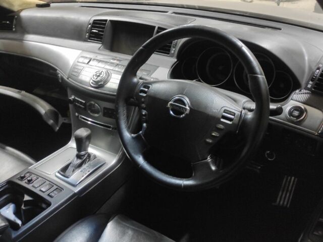 Синий Инфинити M35, объемом двигателя 3.5 л и пробегом 240 тыс. км за 2305 $, фото 5 на Automoto.ua