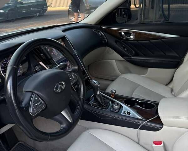 Белый Инфинити Q50, объемом двигателя 3.7 л и пробегом 180 тыс. км за 15500 $, фото 12 на Automoto.ua