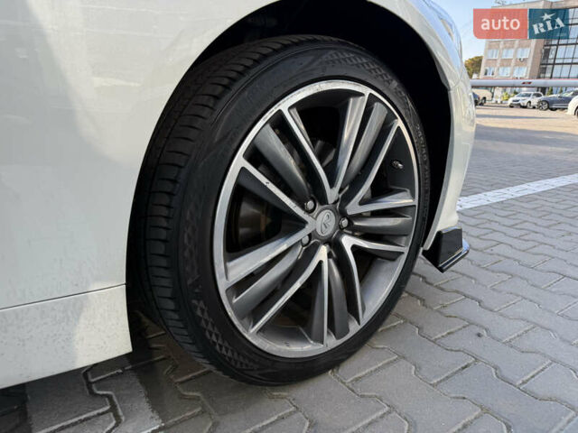 Белый Инфинити Q50, объемом двигателя 2.14 л и пробегом 63 тыс. км за 18200 $, фото 26 на Automoto.ua