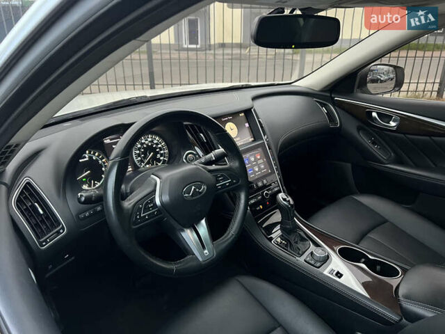 Белый Инфинити Q50, объемом двигателя 3 л и пробегом 144 тыс. км за 15900 $, фото 18 на Automoto.ua