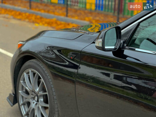 Черный Инфинити Q50, объемом двигателя 3.7 л и пробегом 202 тыс. км за 14000 $, фото 5 на Automoto.ua