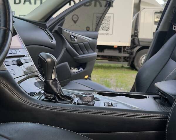 Черный Инфинити Q50, объемом двигателя 3.7 л и пробегом 209 тыс. км за 15000 $, фото 61 на Automoto.ua