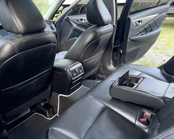 Черный Инфинити Q50, объемом двигателя 3.7 л и пробегом 209 тыс. км за 15000 $, фото 57 на Automoto.ua