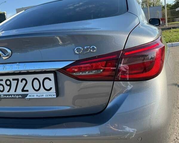 Серый Инфинити Q50, объемом двигателя 3 л и пробегом 56 тыс. км за 23400 $, фото 4 на Automoto.ua