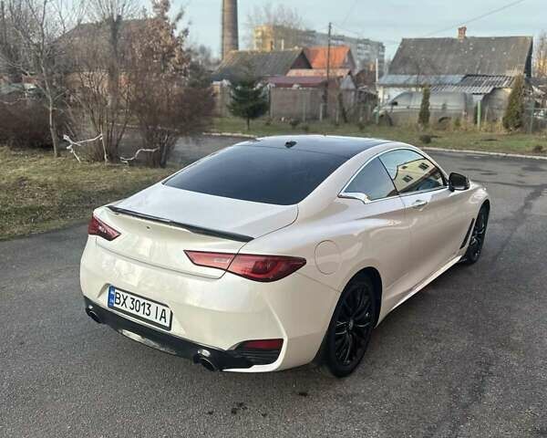 Белый Инфинити Q60, объемом двигателя 3 л и пробегом 69 тыс. км за 20100 $, фото 5 на Automoto.ua