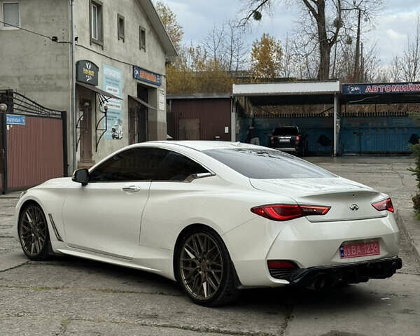 Білий Інфініті Q60, об'ємом двигуна 2 л та пробігом 163 тис. км за 17950 $, фото 7 на Automoto.ua