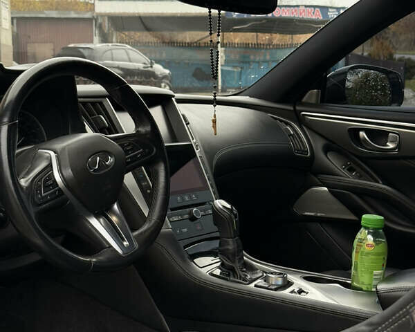 Белый Инфинити Q60, объемом двигателя 2 л и пробегом 163 тыс. км за 18750 $, фото 14 на Automoto.ua
