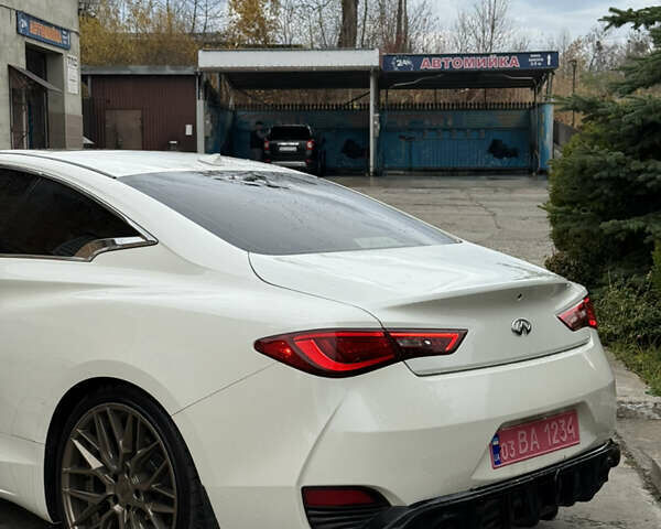 Белый Инфинити Q60, объемом двигателя 2 л и пробегом 163 тыс. км за 18750 $, фото 9 на Automoto.ua