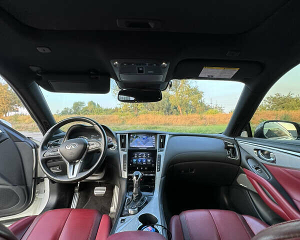 Белый Инфинити Q60, объемом двигателя 3 л и пробегом 104 тыс. км за 26800 $, фото 3 на Automoto.ua