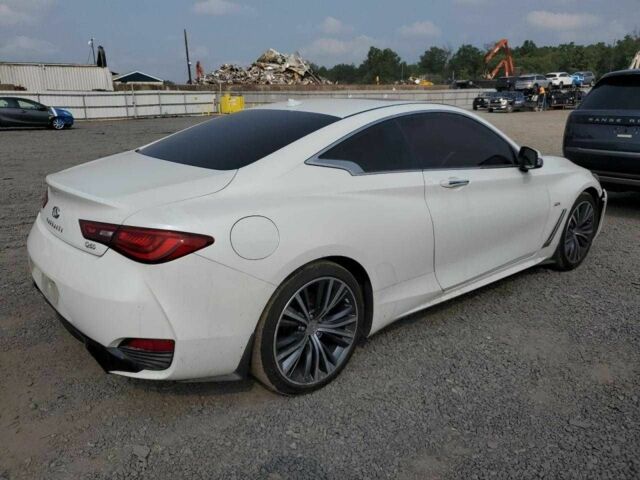 Белый Инфинити Q60, объемом двигателя 2 л и пробегом 210 тыс. км за 10700 $, фото 1 на Automoto.ua