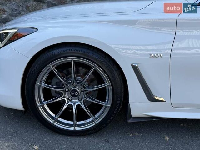 Білий Інфініті Q60, об'ємом двигуна 3 л та пробігом 101 тис. км за 22900 $, фото 29 на Automoto.ua